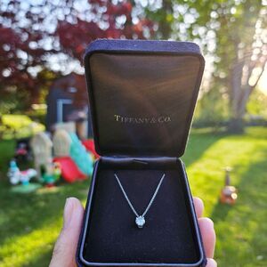 $4510 Tiffany & Co. Round Brilliant Diamond Solitaire 0.36 ct Platinum Necklace